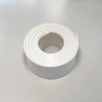 Flexible Teflon (PTFE) strip for custom applications, shown in a close-up image with a smooth, shiny surface.
