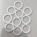Small Teflon (PTFE) rings from RubberXL, durable and corrosion-resistant sealing rings for industrial applications.