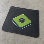 Black rubber mudflap with BouwmarktXL logo, placed on concrete surface, showcasing durable truck accessory branding.