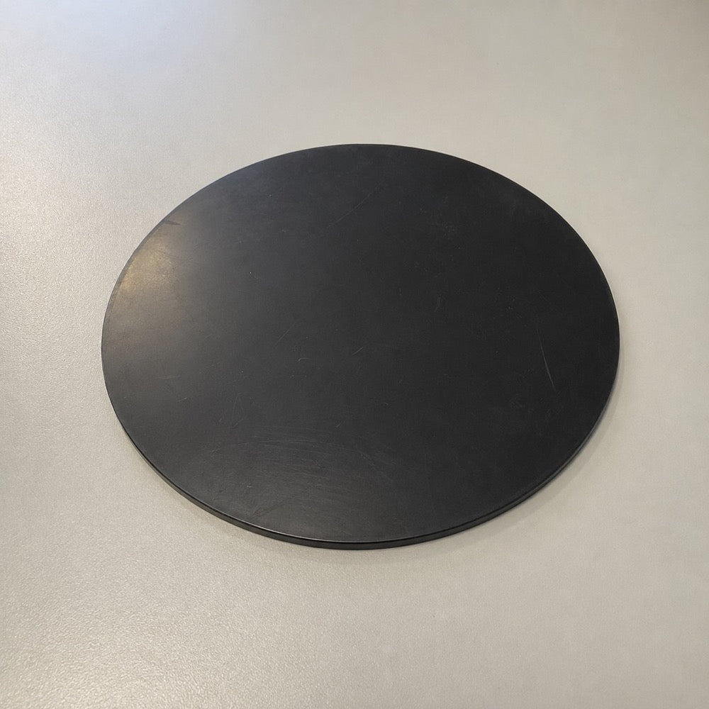 Solid custom plastic disc from BouwmarktXL, showing a durable, smooth surface suitable for various construction applications.