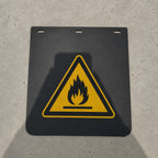 Yellow warning sign with a spatula illustration for rubber bedrukken, displayed on a shadowed background.
