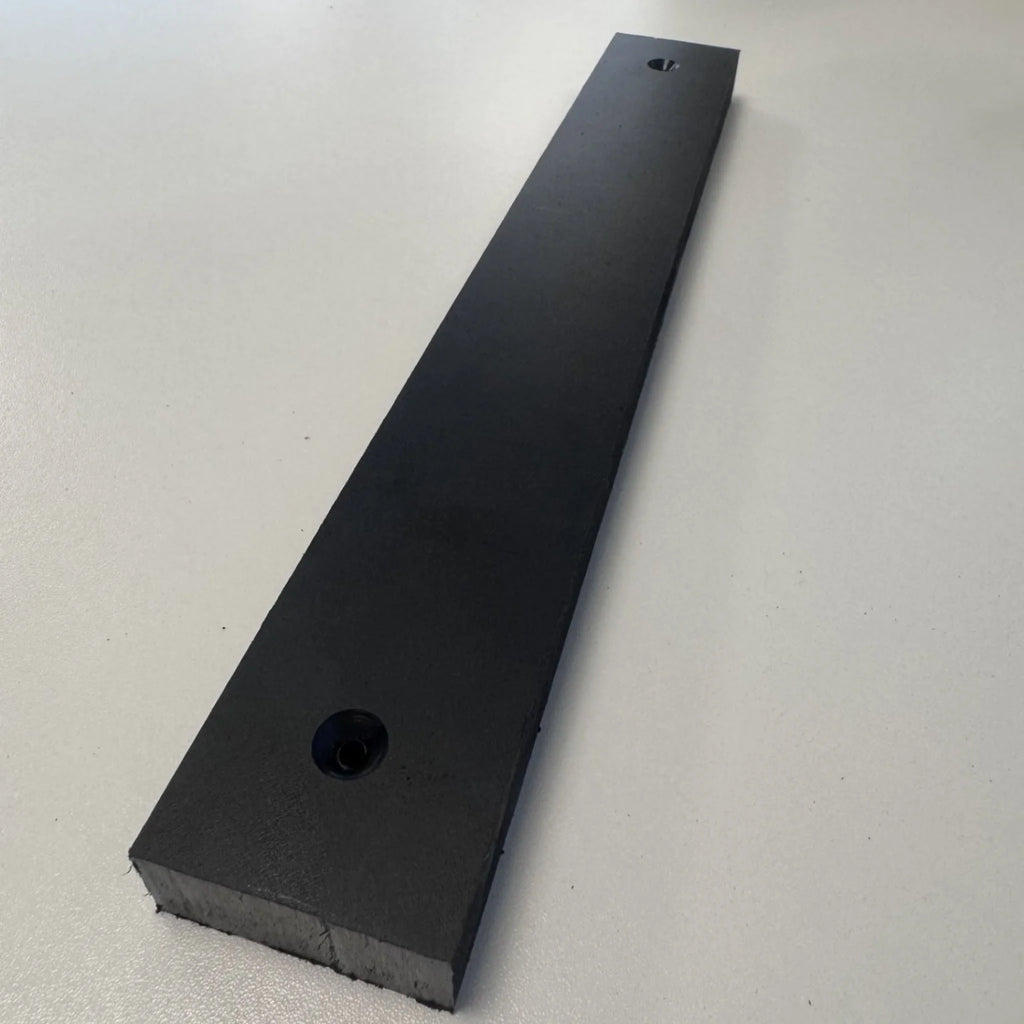 Plastic building blocks with holes from BouwmarktXL, arranged in a strip for construction or educational use.