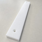 Teflon (PTFE) custom-cut strip with holes, ideal for sealing and insulation applications, shown with multiple holes in the strip.