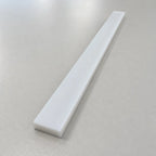 Custom Teflon (PTFE) strip from BouwmarktXL, showing a close-up of the smooth, flexible Teflon material for industrial use.