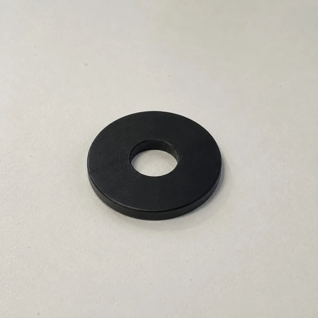 Black custom-made plastic ring from BouwmarktXL, featuring realistic PTFE material for industrial or DIY applications.